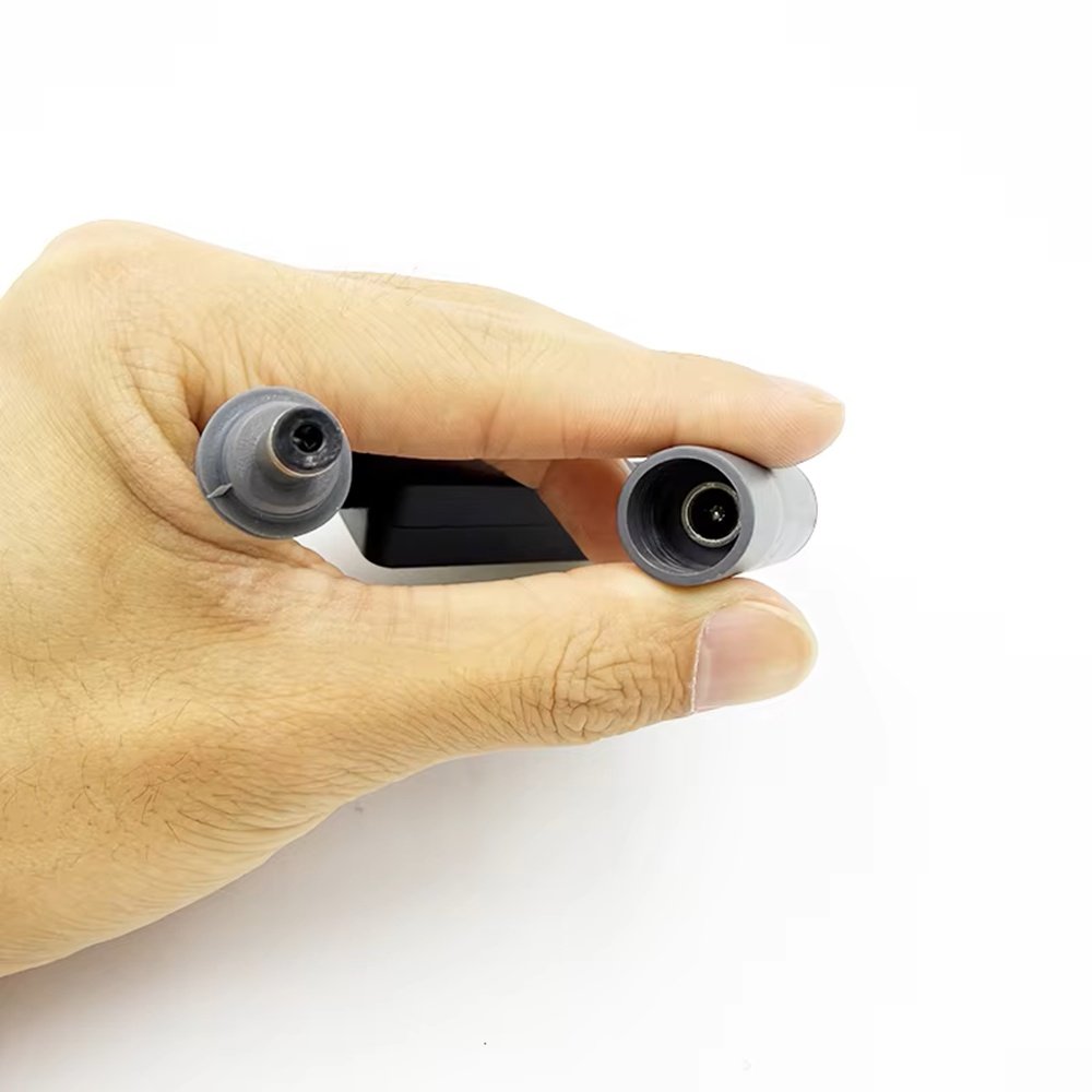 Close-up of DC male and female connectors on Air Vision Systems Starlink remote power switch dish end